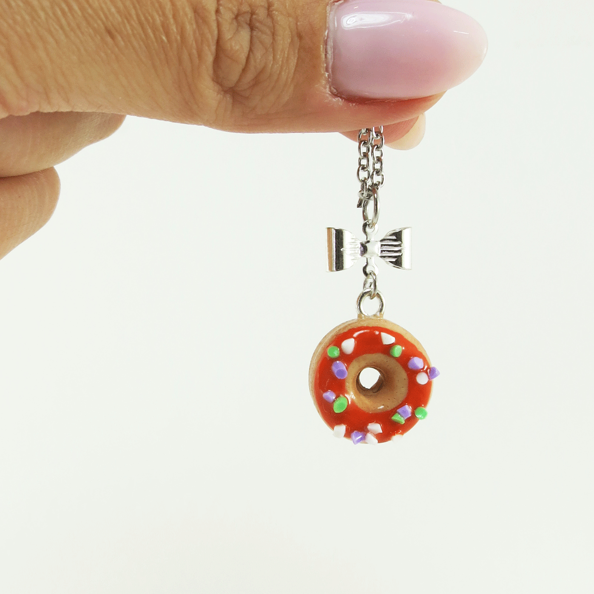 Beigne orange & confettis mauve / blanc / vert